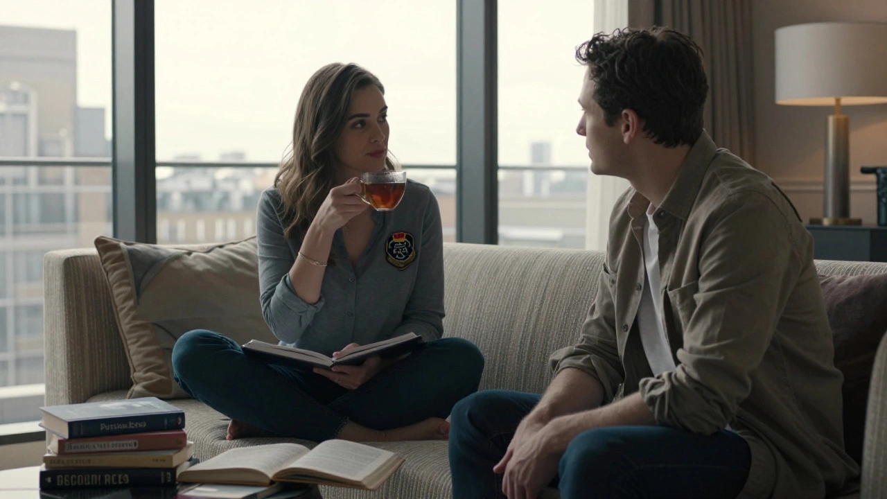 A woman with academic notes sips tea in a sunlit penthouse, sharing quiet moments with a guest.